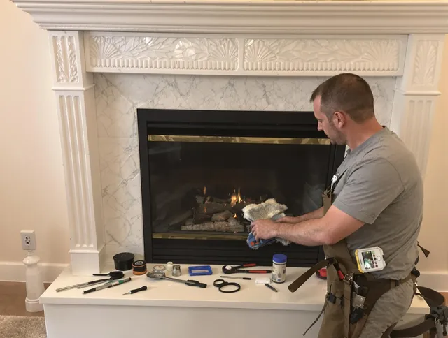 Poinciana Chimney Sweep performing fireplace maintenance in Poinciana, FL